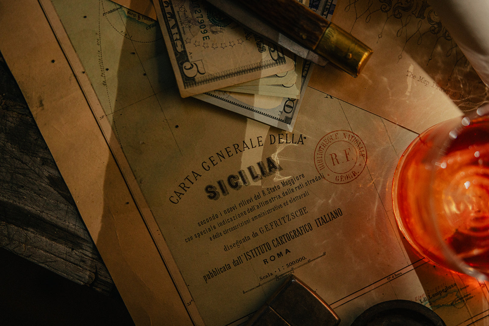 Eduardo's plans of Sicily with a glass of Negroni